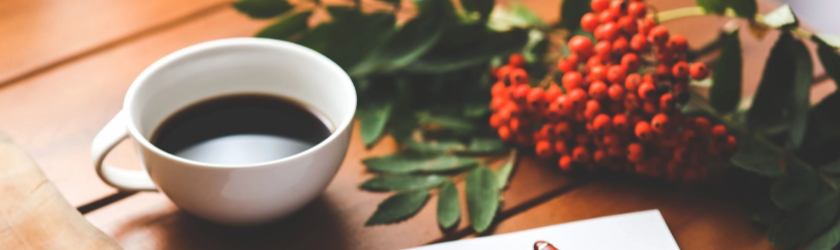 photo of coffee cup with flowers